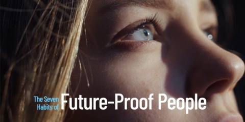 A close up of a person's face with the words future - proof people